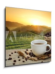 Obraz 1D - 50 x 50 cm F_F125680313 - Hot Coffee cup with Coffee beans on the wooden table and the pla