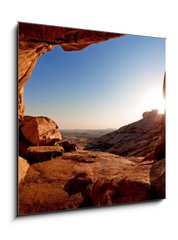 Sklenn obraz 1D - 50 x 50 cm F_F14081453 - Cave and sunset in the desert mountains