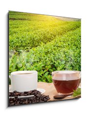 Obraz 1D - 50 x 50 cm F_F160363480 - Coffee or tea in the morning on the wooden table and the Tea plantation background