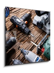 Sklenn obraz 1D - 50 x 50 cm F_F321607758 - Power Tools On Wooden Desk