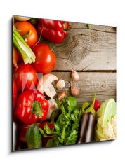 Sklenn obraz 1D - 50 x 50 cm F_F45549352 - Healthy Organic Vegetables on the Wooden Background