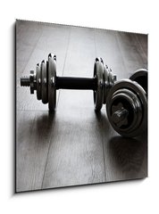 Obraz 1D - 50 x 50 cm F_F60282461 - dumbells on wooden floor - činky na dřevěné podlaze