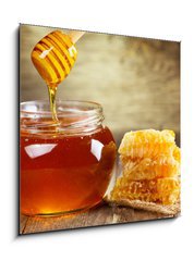 Sklenn obraz 1D - 50 x 50 cm F_F61593982 - jar of honey with honeycomb