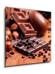 Sklenn obraz 1D - 50 x 50 cm F_F63094547 - uova pasquali e cioccolato assortito sul tavolo di legno