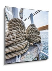 Sklenn obraz 1D - 50 x 50 cm F_F63459591 - Wooden pulley and ropes on old yacht.