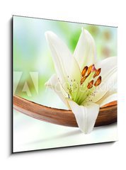 Obraz 1D - 50 x 50 cm F_F64734050 - Beautiful white lily flower on a coco palm leaf