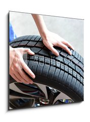 Obraz 1D - 50 x 50 cm F_F66921054 - Reifenwechsel in einer KFZ Werkstatt // Tire change by mechanic