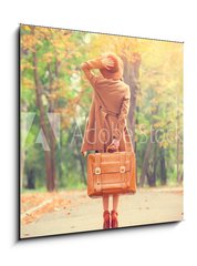 Obraz   Redhead girl with suitcase in the autumn park., 50 x 50 cm