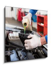 Obraz 1D - 50 x 50 cm F_F76802503 - Mechanic pouring oil into car - Mechanik nalévá olej do auta