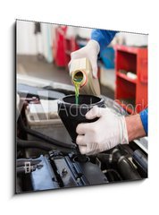 Obraz 1D - 50 x 50 cm F_F76802503 - Mechanic pouring oil into car - Mechanik nalv olej do auta