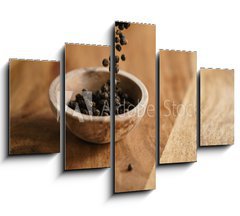 Obraz   black dry pepper fall into wooden bowl on table, 150 x 100 cm