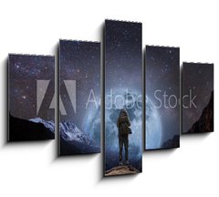 Obraz 5D ptidln - 150 x 100 cm F_GB205708981 - a man with backpack standing on mountain peak at night, and silhouette mountain with bright full moon and sky full of stars