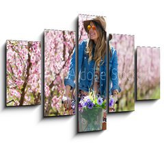 Obraz   Beautiful young woman with a vintage bike in the field., 150 x 100 cm