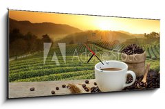 Obraz s hodinami 1D panorama - 120 x 50 cm F_AB125680313 - Hot Coffee cup with Coffee beans on the wooden table and the pla - Horký šálek kávy s kávová zrna na dřevěný stůl a pla