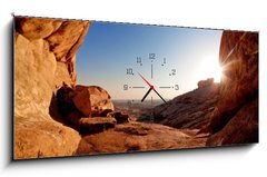 Obraz s hodinami 1D panorama - 120 x 50 cm F_AB14081453 - Cave and sunset in the desert mountains