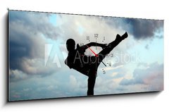 Obraz s hodinami 1D panorama - 120 x 50 cm F_AB16108587 - Kung fu at the edge