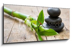 Obraz s hodinami 1D panorama - 120 x 50 cm F_AB176854248 - Hot stone with bamboo
