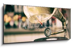 Obraz s hodinami 1D panorama - 120 x 50 cm F_AB195074759 - Retro old gramophone radio. Vintage style toned photo