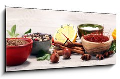 Obraz s hodinami 1D panorama - 120 x 50 cm F_AB201764347 - Spices and herbs on table. Food and cuisine ingredients.