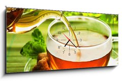 Obraz s hodinami 1D panorama - 120 x 50 cm F_AB21155419 - Pouring Healthy Tea