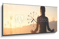 Obraz s hodinami   silhouette fitness girl practicing yoga on mountain, 120 x 50 cm