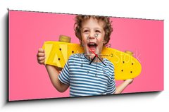 Obraz s hodinami 1D - 120 x 50 cm F_AB245786759 - Happy curly boy laughing and holding skateboard - Šťastný kudrnatý chlapec se směje a drží skateboard