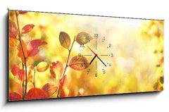 Obraz s hodinami 1D panorama - 120 x 50 cm F_AB264386223 - Beautiful colorful autumn natural background panorama. Orange autumn foliage on blurred gold background glows in sunlight outdoors in nature. Template with copy space.