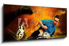 Obraz s hodinami 1D panorama - 120 x 50 cm F_AB27573195 - Football player in fires flame on the outdoors field