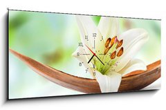 Obraz s hodinami 1D panorama - 120 x 50 cm F_AB29781120 - Beautiful white lily flower on a coco palm leaf