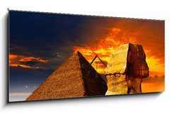 Obraz s hodinami 1D panorama - 120 x 50 cm F_AB42751455 - Great Sphinx and the Pyramids at sunset - Velká sfinga a pyramidy při západu slunce