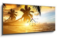 Obraz s hodinami 1D panorama - 120 x 50 cm F_AB47283055 - sunset on the beach of caribbean sea