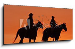 Obraz s hodinami 1D panorama - 120 x 50 cm F_AB47782535 - Cowboys on Horseback Silhouette at sunset - Cowboys na koni silueta při západu slunce