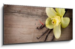 Obraz s hodinami   Vanilla Pods and Flower over Wooden Background, 120 x 50 cm