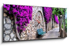 Obraz s hodinami   Vibrant flower draped pathway in Capri, Italy, 120 x 50 cm
