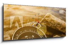 Obraz s hodinami 1D panorama - 120 x 50 cm F_AB60262537 - compass on the shore at sunrise