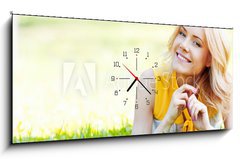 Obraz s hodinami 1D panorama - 120 x 50 cm F_AB61490597 - Woman on grass - ena na trv