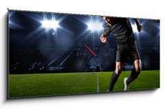 Obraz s hodinami 1D panorama - 120 x 50 cm F_AB66124797 - Hispanic Soccer Player heading the ball - Hispánský fotbalista míří míč