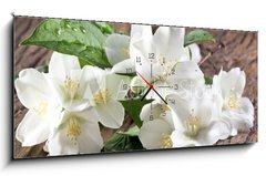 Obraz s hodinami 1D panorama - 120 x 50 cm F_AB66646969 - Jasmine flowers over old wooden table.