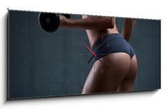 Obraz s hodinami   Very sexy young beautiful ass in thong. Beautiful athletic woman, 120 x 50 cm