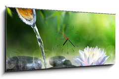 Obraz s hodinami 1D panorama - 120 x 50 cm F_AB70564979 - zen garden with massage stones and waterlily