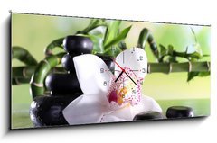 Obraz s hodinami 1D panorama - 120 x 50 cm F_AB71191786 - Spa stones and white orchid on table on natural background
