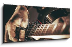 Obraz s hodinami 1D panorama - 120 x 50 cm F_AB75672413 - Rockman Guitar Player