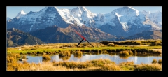 Obraz s hodinami 1D panorama - 120 x 50 cm F_AB77312300 - Eiger, Mnch und Jungfrau
