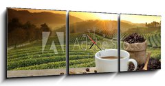 Obraz s hodinami   Hot Coffee cup with Coffee beans on the wooden table and the pla, 150 x 50 cm