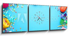 Obraz s hodinami   Birthday party caps, blowers and candles on blue background, 150 x 50 cm