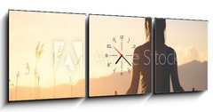 Obraz s hodinami   silhouette fitness girl practicing yoga on mountain, 150 x 50 cm