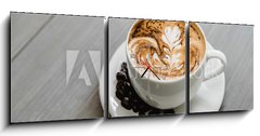 Obraz s hodinami 3D tdln - 150 x 50 cm F_BM320686754 - Fresh brewed coffee with fern pattern latte art in white cup