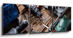 Obraz s hodinami 3D tdln - 150 x 50 cm F_BM321607758 - Power Tools On Wooden Desk