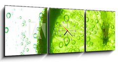 Obraz s hodinami   lime slice in water, 150 x 50 cm