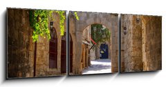 Obraz s hodinami 3D tdln - 150 x 50 cm F_BM43877162 - Medieval arched street in the old town of Rhodes, Greece